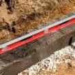 how-to-build-a-retaining-wall-using-railroad-ties-1