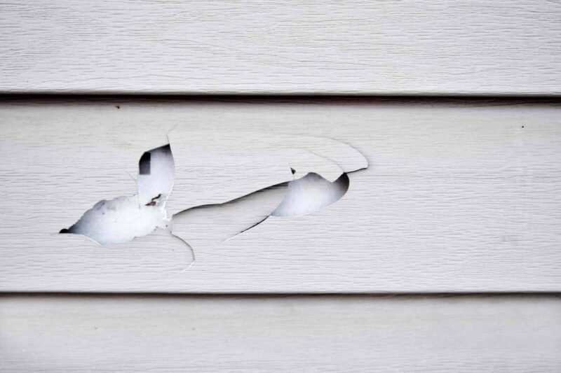 how-to-replace-a-piece-of-vinyl-siding-cutting-in-1